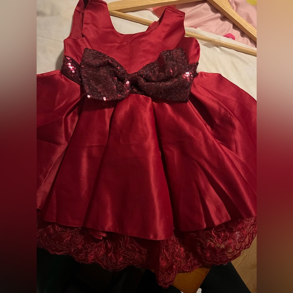 Party dress never worn, size 90 which is for ages 2-3 yrs old, color red
